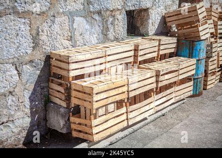 Pallets wooden boxes . Outdoor Storage . Crates on the street Stock Photo