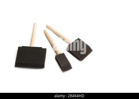 Black foam brushes on a white background with copy space Stock Photo