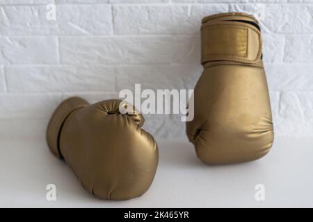 Pair of leather boxing gloves isolated on white Stock Photo