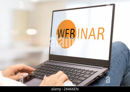 webinar. start page, splash screen for webinar on laptop pc. mobile remote learning, online courses. digital technologies in education Stock Photo