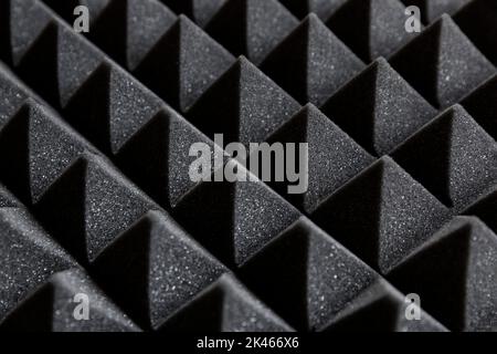 Close-up of soundproofing foam panel. Audio soundproofing. Pyramidal shape. Stock Photo