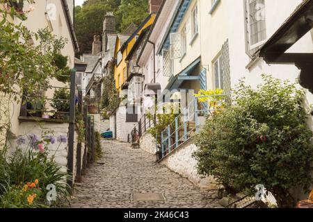 view of cottages and cobbles on narrow street in Clovelly, North Devon, UK, August. Stock Photo