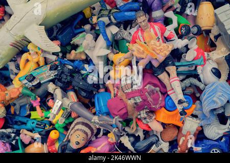 Various plastic toys (cars & trucks) at the flea market in Hanover (No. 50) Stock Photo