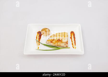 Pan Fried Salmon Recip, isolated on white background, top view Stock Photo