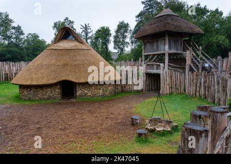 Wexford, Ireland - 18 August, 2022: view of a reconstructed early medieval ringfort in the Irish National heritage Park Stock Photo