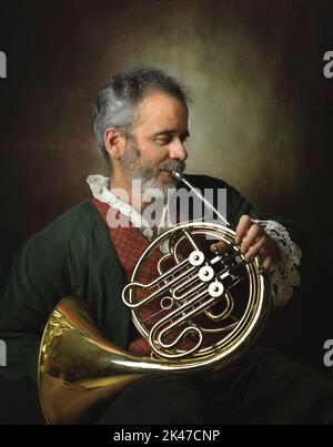 player french horn an ancient musical metal instrument popular in classical brass music an instrument beloved by children and adults, amateurs and Stock Photo