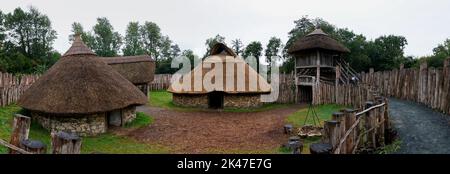 Wexford, Ireland - 18 August, 2022: panorama view of a reconstructed early medieval ringfort in the Irish National heritage Park Stock Photo