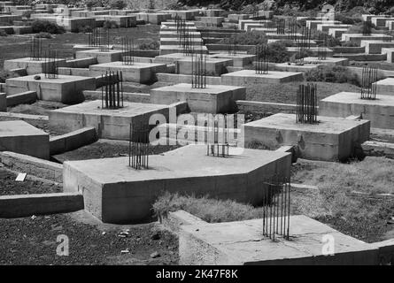 Construction ruins of unfinished houses Stock Photo