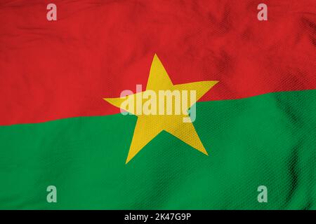 Full frame close-up on a waving flag of Burkina Faso in 3D rendering. Stock Photo