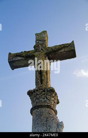 18th century stone crucifix depicting the crucified Jesus Christ Stock Photo