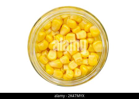 Jar of canned sweet corn, isolated. Pickled sweet corn on white. Top view. Stock Photo