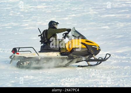 CBP Office of Border Patrol conducts cold weather operations in the Wellesley Island, Alexandria Bay and Clayton region of New York along the border of the United States and Canada. Border Patrol Agents patrol frozen water ways along the border with the U.S. and Canada. Photo by James Tourtellotte Stock Photo