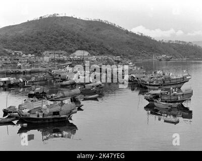 Horizontal Black & White view of fishing boats moored at Saam Mun Jai, Tai Po, New Territories, Hong Kong 1984 Stock Photo
