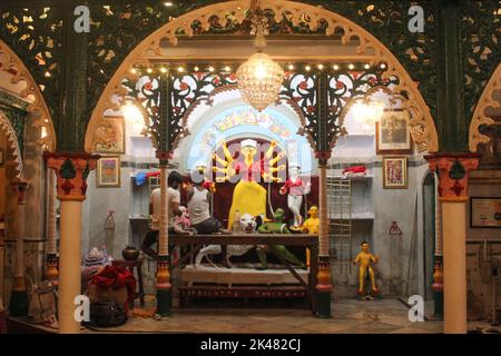 Kolkata, India. 30th Sep, 2022. One of the oldest and most honoured families in the city, this family of gun merchants has been around this area since the early 1800's. The Daws of Jorasanko have been celebrating Durga Puja in their Thakurdalan since 1859. The Late Sri Narasingha Chandra Daw established this pujo in Thakurdalan, and it is still observed with the same rites, rituals, and tradition by current generations. The baton has been passed on from generation to generation, but traditions and rituals have mostly remained unchanged, and the observance of this pujo adheres to strict religio Stock Photo