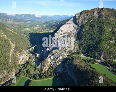 AERIAL VIEW. Historic landslide in the upper Drôme Valley. It occured in 1442, and created two lakes, now drained. Le Claps, Luc-en-Diois, France. Stock Photo