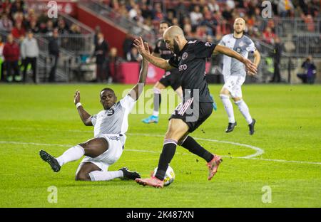 Toronto, Canada. 30th Sep, 2022. Gonzalo Higuain (front R) of Inter Miami CF vies with Chris Mavinga (L) of Toronto FC during the 2022 Major League Soccer (MLS) match at BMO Field in Toronto, Canada, Sept. 30, 2022. Credit: Zou Zheng/Xinhua/Alamy Live News Stock Photo