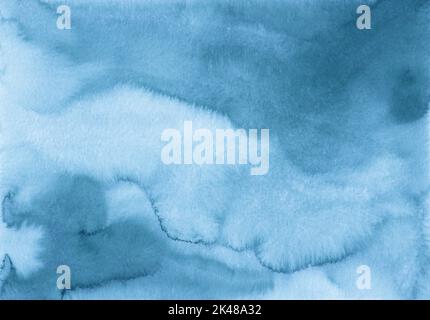 Watercolor calm blue background with space for text. Sea blue stains on paper, hand painted. Stock Photo