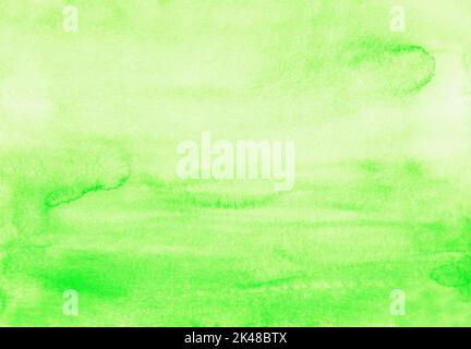 Watercolor light green yellow ombre background texture. Watercolour pastel green gradient backdrop. Stains on paper. Stock Photo