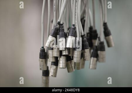 Giurgiu, Romania - June 29, 2020: Shallow depth of field (selective focus) details with a bunch of cables. Stock Photo