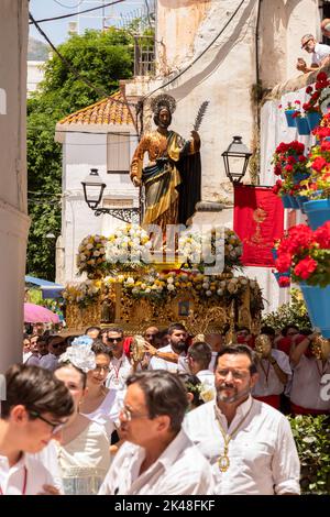 Statue of Saint Bernard on the float being carried into the church in the Romeria San Bernabe in Marbella, Spain. Stock Photo