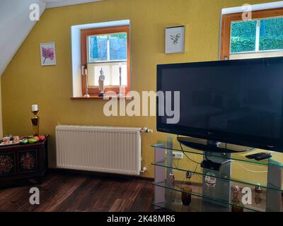 Kitzeck im Sausal, Austria - September 20, 2022: Guesthouse in the mountain village in Southern Styria, room decorated with old and new furniture, the Stock Photo