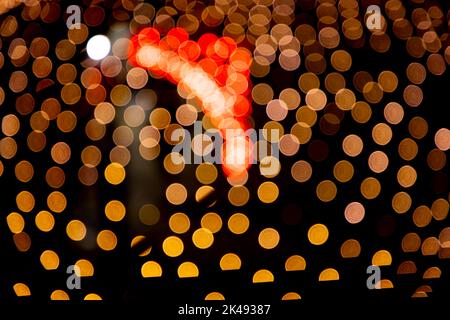 Golden Red Dfocus Abstract bokeh light effects on the night black background texture Stock Photo
