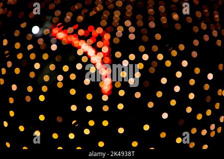 Golden Red Dfocus Abstract bokeh light effects on the night black background texture Stock Photo