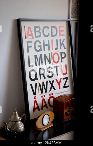 Vintage eye test opticians board with red and black capital letters on wooden board Stock Photo