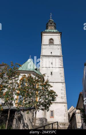 Bell tower of the St. Jacob Church in city of Skofja Loka, Slovenia. Stock Photo