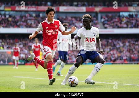 Arsenal’s Takehiro Tomiyasu (left) and Tottenham Hotspur's Davinson Sanchez during the Premier League match at the Emirates Stadium, London. Picture date: Saturday October 1, 2022. Stock Photo