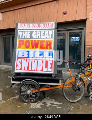 A sign on a bike during a Enough is Enough rally in Glasgow to protest against rising energy bills and the cost of living crisis. Picture date: Saturday October 1, 2022. Stock Photo