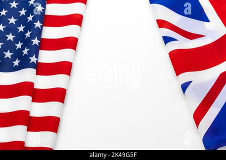 Flags of the USA and brithish Union Jack flag together waving Stock Photo