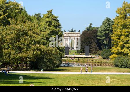 Arco della Pace (Arch of Peace 1814) in the Parco Sempione (Sempione park) is a large city public park in downtown of Milan (Milano), Italy, Europe. Stock Photo