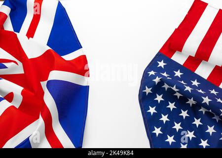 Flags of the USA and brithish Union Jack flag together waving Stock Photo