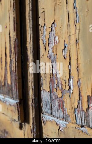 peeling paint on wooden window shutters Stock Photo