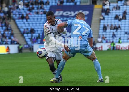 Coventry, UK. 01st Oct, 2022. Isaiah Jones #2 of Middlesbrough is tackled by Jake Bidwell #27 of Coventry City during the Sky Bet Championship match Coventry City vs Middlesbrough at Coventry Building Society Arena, Coventry, United Kingdom, 1st October 2022 (Photo by Gareth Evans/News Images) in Coventry, United Kingdom on 10/1/2022. (Photo by Gareth Evans/News Images/Sipa USA) Credit: Sipa USA/Alamy Live News Stock Photo