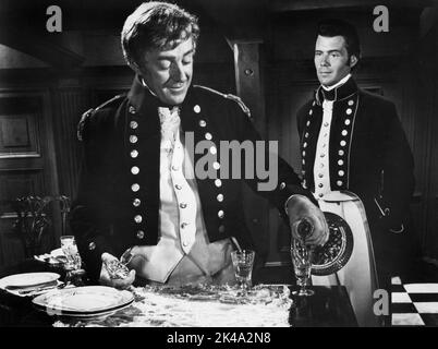 Alec Guinness, Dirk Bogarde, on-set of the British Film, 'H.M.S. Defiant', U.S. Title, 'Damn the Defiant!', Columbia Pictures, 1962 Stock Photo