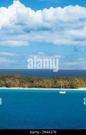 Half Moon Cay, Bahamas. Sail Boat Anchored off Half Moon Cay, a Coral