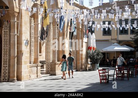 Nicosia, Cyprus - August 09, 2021: People at Faneromeni Square in front of Faneromeni church Stock Photo