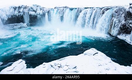 Godafoss waterfall, snowy landscape, drone shot, Northern Iceland Eyestra, Iceland Stock Photo