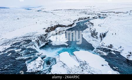 Godafoss waterfall, snowy landscape, drone shot, Northern Iceland Eyestra, Iceland Stock Photo