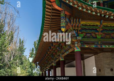 Colourful timber exterior structure and pagoda of Chinese Dungan Uyghur Mosque in Zharkent, Kazakhstan Stock Photo