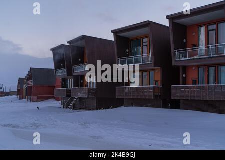 Residential buildings on stilts on a cold winter day in Longyearbyen, Svalbard Stock Photo