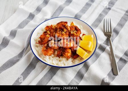 Homemade Hawaiian Garlic Shrimp Scampi on a Plate, side view. Stock Photo