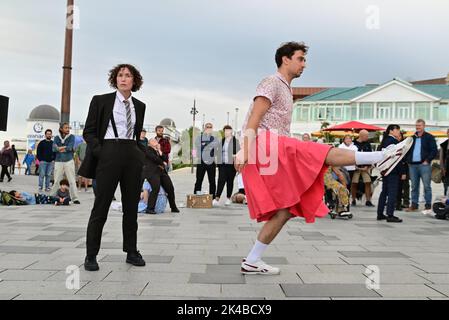 Bournemouth, Dorset, UK, Saturday 1st October 2022. Frock, a celebration of individuality and difference, by Stop Gap Theatre performance group at Pier Approach as part of the annual Arts by The Sea Festival. Credit: Paul Biggins/Alamy Live News Stock Photo