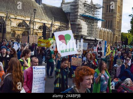 London, UK. 1st October 2022. Just Stop Oil and Extinction Rebellion protesters block Parliament Square. The march was part of the day's Enough Is Enough protests which saw various groups come together in protest against the cost of living crisis, rising energy bills, climate change and the Tory Government, and in solidarity with the ongoing strikes around the UK. Credit: Vuk Valcic/Alamy Live News Stock Photo