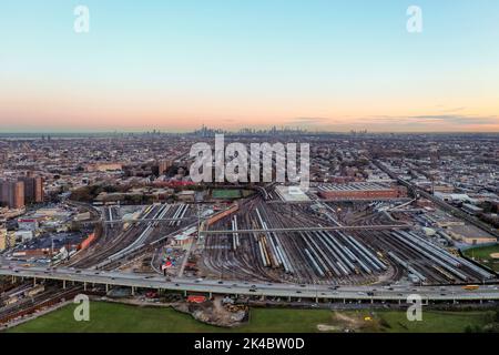 New York - Nov 4, 2021: Coney Island train yard and the Belt Parkway in Brooklyn, New York. Stock Photo