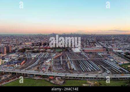 New York - Nov 4, 2021: Coney Island train yard and the Belt Parkway in Brooklyn, New York. Stock Photo