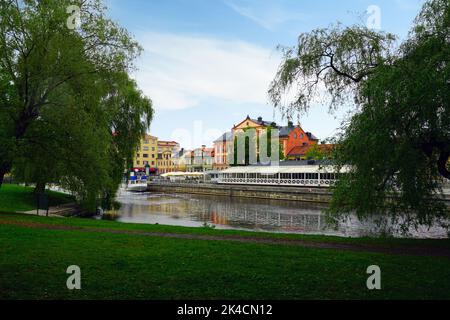 UPPSALA, SWEDEN -1 JUN 2022- View of boats on the Fyrisan river in downtown Uppsala, Sweden. Stock Photo