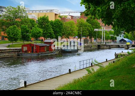 UPPSALA, SWEDEN -1 JUN 2022- View of boats on the Fyrisan river in downtown Uppsala, Sweden. Stock Photo
